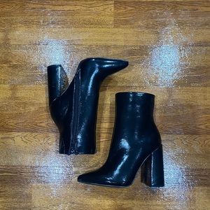 Brand new black booties. Size 6.5